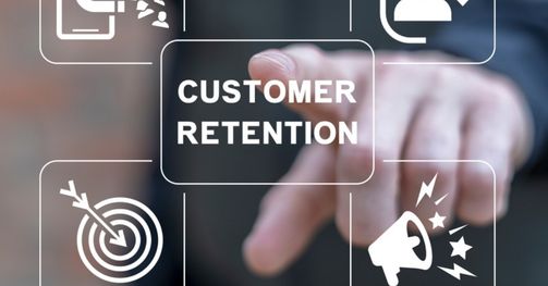 Image of a man pointing at customer retention emphasizing how important it is for revenue growth
