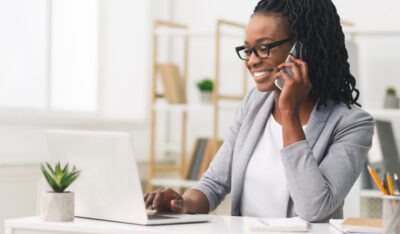 Image of a sales representative making cold calls after getting training in Fanatical Prospecting from Sales Gravy