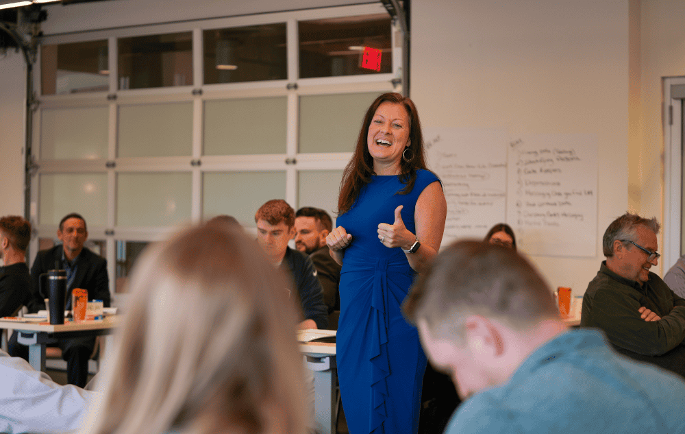 Senior Master Trainer Jessica Stokes leading a high-energy sales coaching session at Sales Gravy to propel individual growth and team productivity.
