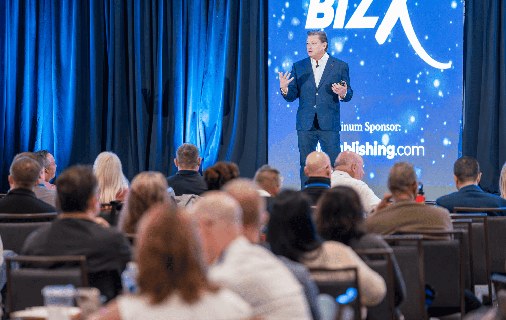 Jeb Blount, best-selling author of Fanatical Prospecting, Sales EQ, and more and CEO of Sales Gravy, the number one sales training organization, on stage speaking to a large enterprise sales team