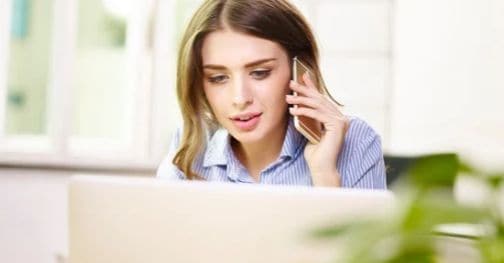 Image of a sales rep make a cold call using scripts to ask for an appointment — cold calling training from Sales Gravy