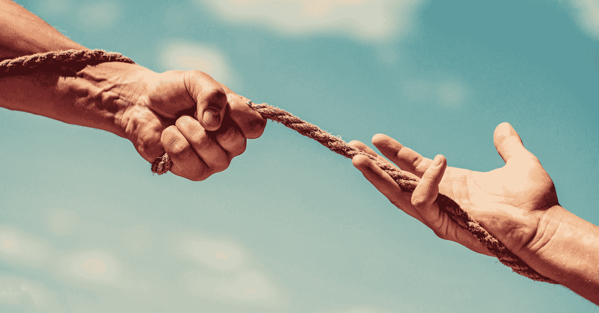 Sales manager resisting the urge to step in while a rep works a deal, illustrating why sales managers shouldn't rescue deals